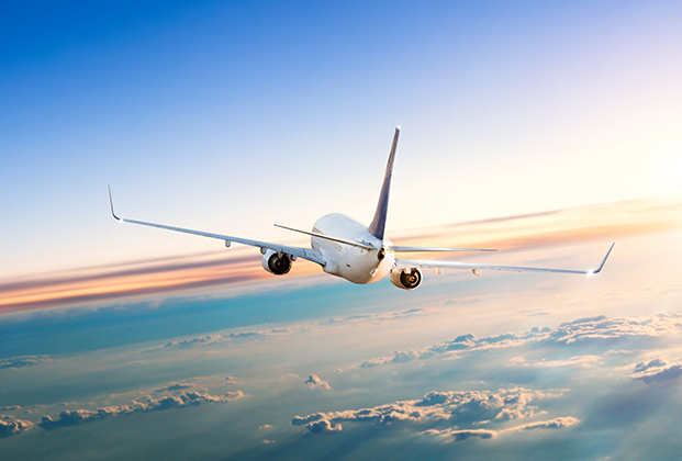 Commercial airliner in flight &mdash; aviation cabin and inflight catering supplies