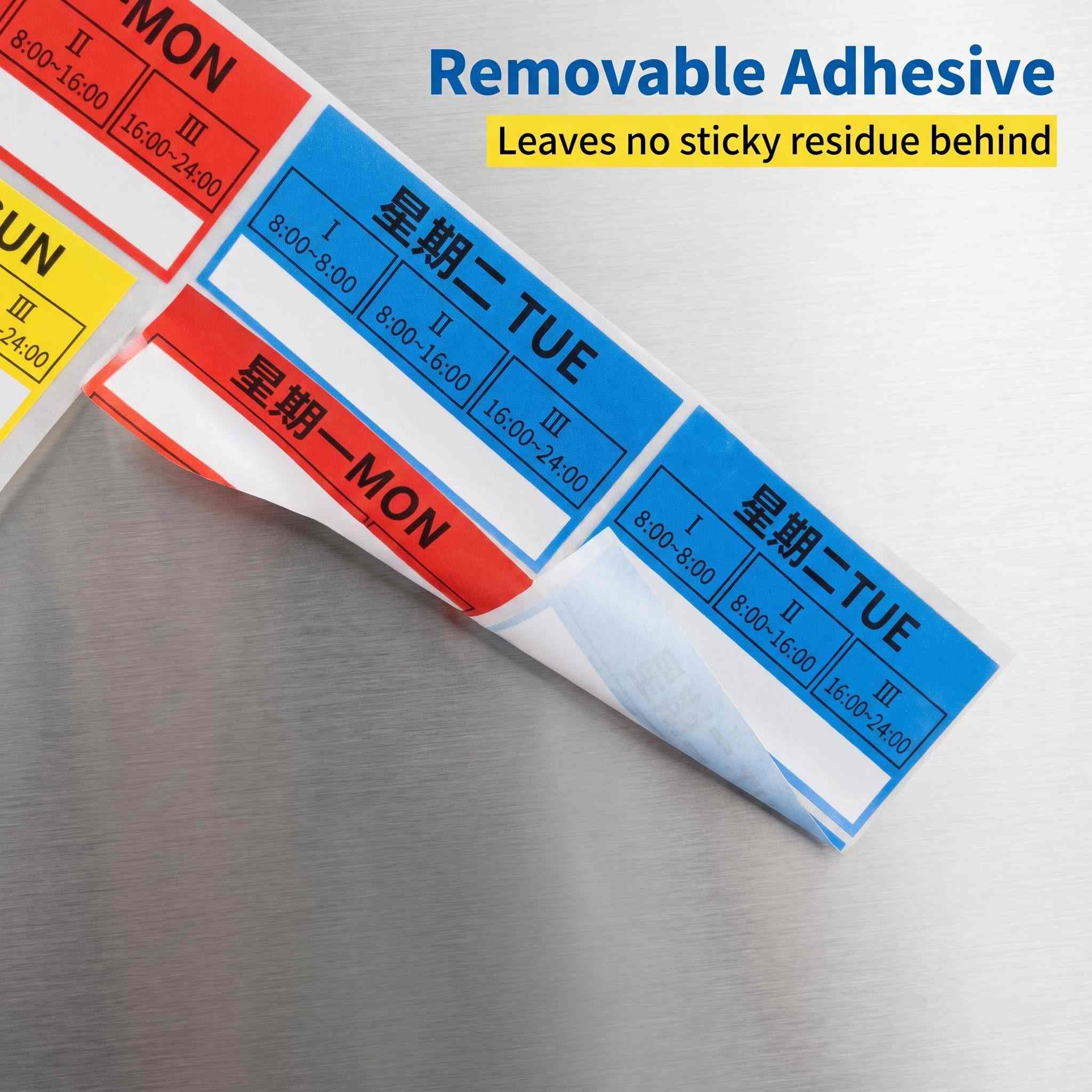 Removable day-of-the-week label peeling off cleanly without adhesive residue Removable day-of-the-week label peeling off cleanly without adhesive residue